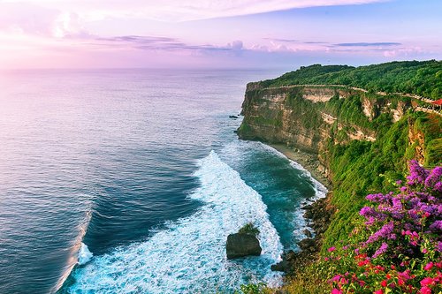 Explore Bali's Uluwatu coastline in October, a region on the southwestern tip of the Bukit Peninsula—known for its dramatic clifftop views and white-sand beaches