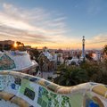 Explore Parc Guëll and watch the setting sun over Barcelona
