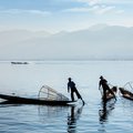 Fisherman on serene Inle Lake