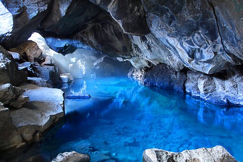 Visit the pristine Grjótagjá hot spring near lake Mývatn in November