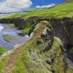 Discover striking landscapes like Fjaðrárgljúfur