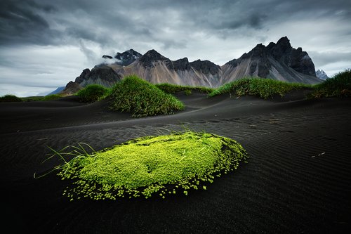 Check out the less frequented Vestrahorn mountains in eastern Iceland's Stokksnes Peninsula when the crowds are heavy in August