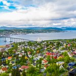 An aerial view of the Arctic city of Tromsø in summer.
