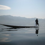 Fisherman on serene Inle Lake