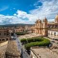Enjoy a gelato as you stroll through the elegant streets of Noto