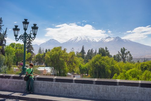 Reading with a scenic backdrop in Arequipa, Peru