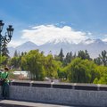 Reading with a scenic backdrop in Arequipa, Peru