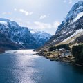 Cruise through the snowy fjords on the Hurtigruten