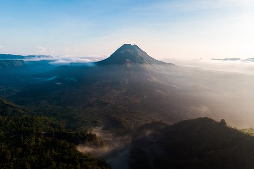 Sunrise and mist at Batur volcano, Kintamani, Bali, Indonesia