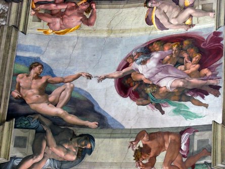 Michelangelo's ceiling fresco showing The Creation of Adam in the Sistine Chapel, Rome