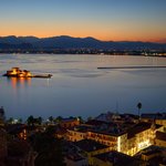 Bay of Nafplio and the Bourtzi Castle at sunset