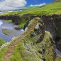 Kirkjufellsfoss Waterfall and Kirkjufell Mountain, along the Snaefellsnes Peninsula