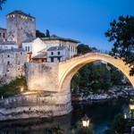 Nighttime view of the Old Ottoman Bridge in Mostar