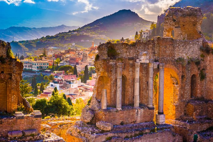 Discover Taormina's ancient Greek theater and admire views of Mount Etna