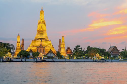 Wat Arun Temple at sunset in Bangkok, Thailand. Wat Arun is a Buddhist temple in Bangkok Yai district of Bangkok, Thailand.
