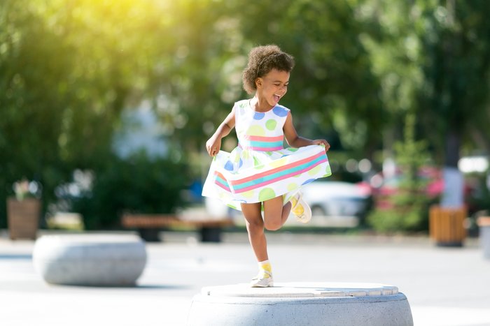 Young tourist dancing in the street