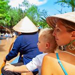 Discover Vietnam from the vantage of a traditional sampan