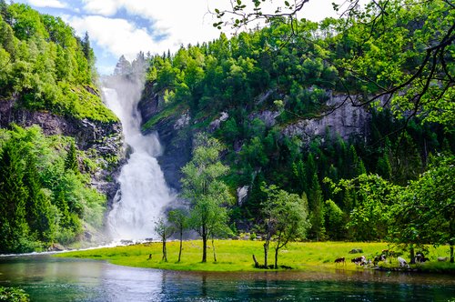 Norway's many waterfalls, like Huldefoss, are rushing during this time of year