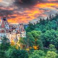 Catch a sunset over famous Bran's Castle outside of Brașov