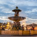 One of Paris's lovely fountains after sundown