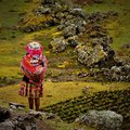 Girl walking home in the Lares Valley
