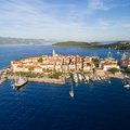 Korčula's historic town-of-the-same-name juts into the Strait of Pelješac