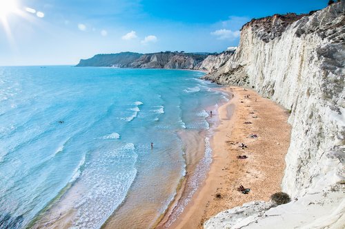 Explore the chalk-white cliffs of Scala dei Turchi before going for a swim
