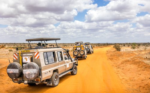 Safari cars in Tsavo East National Park, Kenya