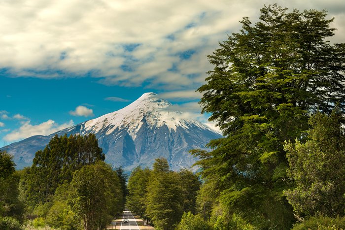 Hike a portion of the Osorno Volcano while staying in a German-style town