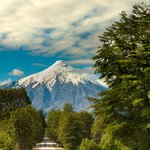 Hike a portion of the Osorno Volcano while staying in a German-style town