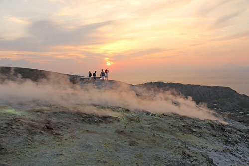 Trek the crater rim amid steaming fumaroles on Vulcano Island