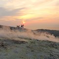 Trek the crater rim amid steaming fumaroles on Vulcano Island