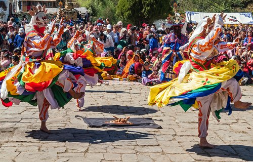 Traditional Bhutanese dancers in a street performance