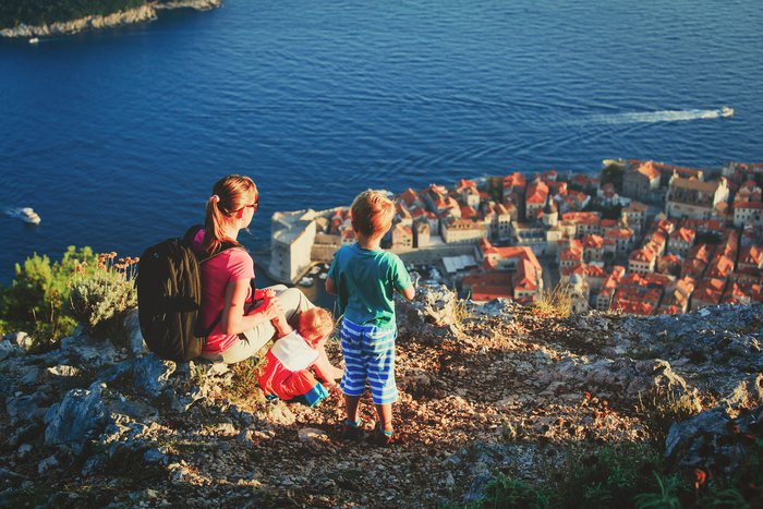 Mom and kids look over Dubrovnik's Old Town from Srđ Mountain