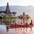 Beratan Lake in Bali Indonesia, June 6 2018 : Balinese villagers participating in traditional religious Hindu procession in Ulun Danu temple Beratan Lake in Bali Indonesia.