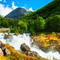 Sail through the Geirangerfjord and get up close to waterfalls