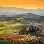 A sunrise washes the Tuscan countryside aglow