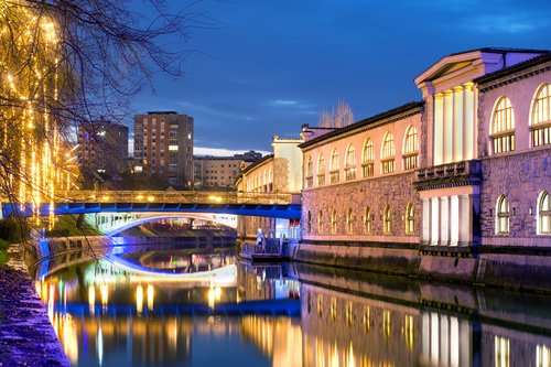 Ljubljana's Butcher's Bridge and market twinkle in the festive season