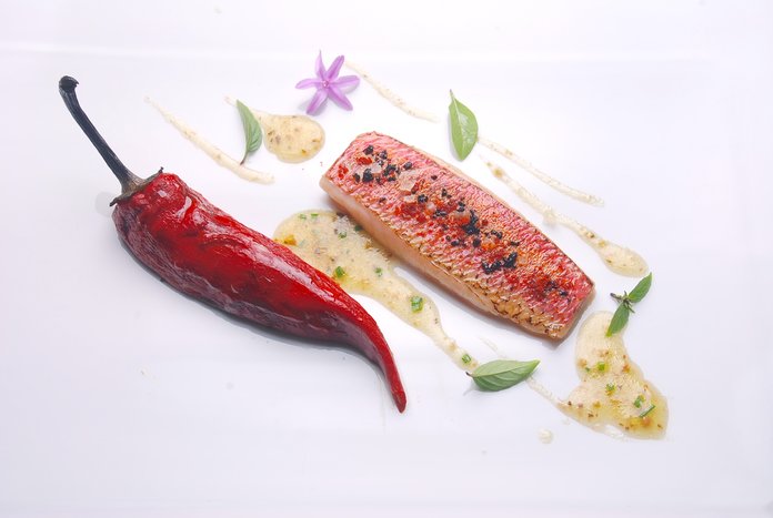 A prepared plate at two-star Michelin Vila Joya