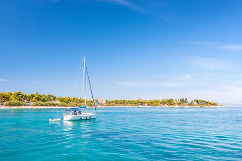 Sailboat in the Supetar harbor on Brac Island