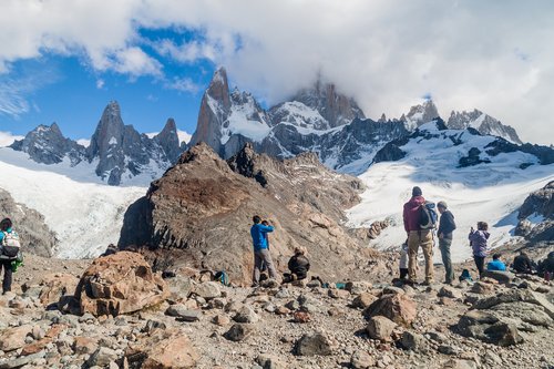 A group of hikers at the base of Mt. Fitz Roy 