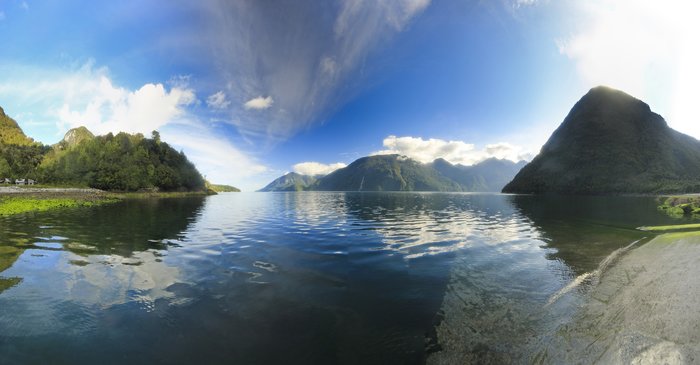 Reflections in the clear waters of a Chilean fjord