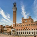 Enjoy a visit to Siena and explore its Medieval buildings