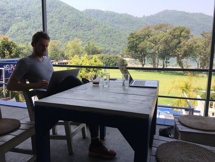 kimkim engineering team shipping new product in Pokhara with Phewa lake in the background