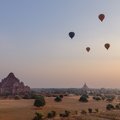 Hot air balloons flying over Dhammayangyi Temple in Bagan