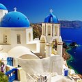 White and blue churches over Santorini's caldera