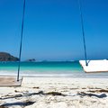 When the sun appears, head to the white sands of Lombok's Kuta beach in May