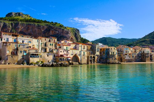 Take a passeggiata along Cefalù's seaside promenade