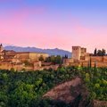 Book yourself to see Andalusia's iconic Alhambra palace and fortress complex in spring or fall