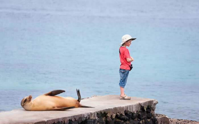 Enjoy meeting the "locals" with your family as you arrive to the Galápagos Islands